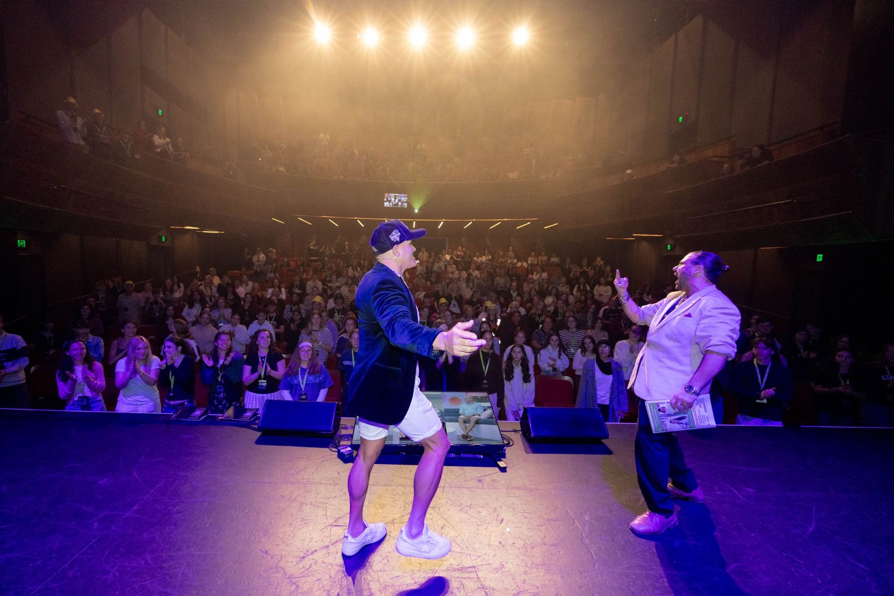 Jeffrey Morgan on stage in front of a packed theatre